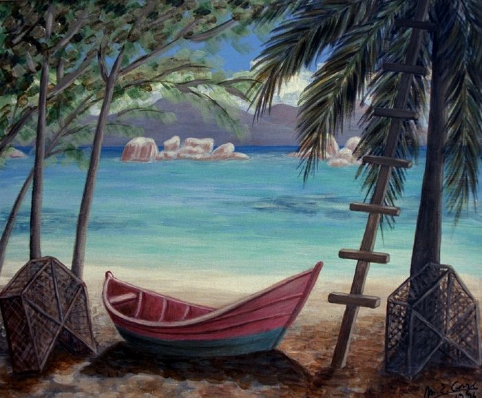 Barque sur la plage à Praslin