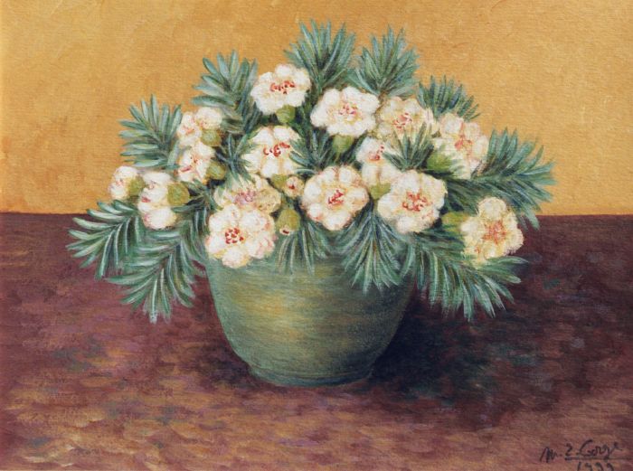 Bouquet de fleurs dans un vase en grés vert