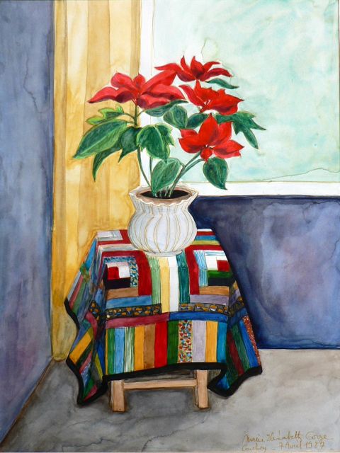 Poinsettia en pot sur un tabouret